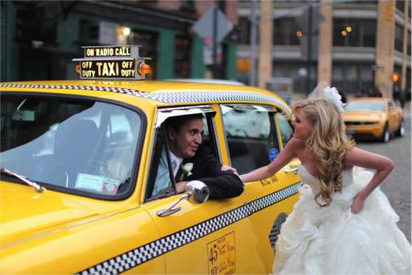 Taxi Cab being Hailed by Bride